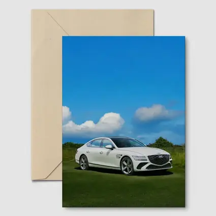 Genesis G80 White Sedan Blue Sky