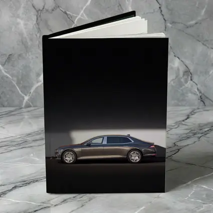 Genesis G90 Luxury Sedan Against White Wall