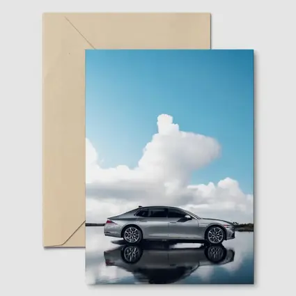 Genesis G90 Silver Sedan Cloudy Sky Reflection