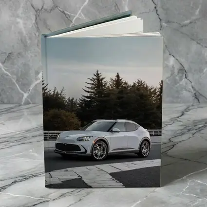 Genesis GV60 Silver SUV Forest Background