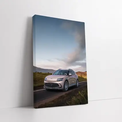 Genesis GV60 SUV on Scenic Highland Road