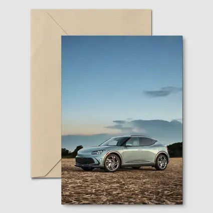 Genesis GV60 Parked on Sandy Beach