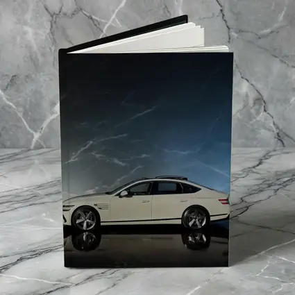 Genesis G80 White Sedan Dark Marble Background