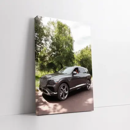 Genesis GV80 SUV Parked Among Green Trees