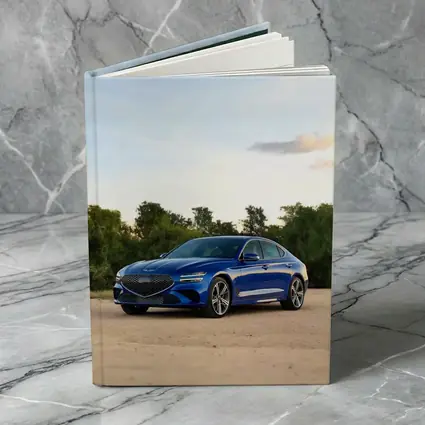 Genesis G70 Blue Sedan Parked Outdoors