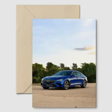 Genesis G70 Blue Sedan Parked Outdoors