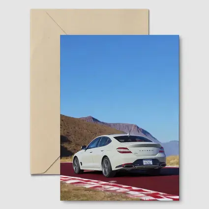 Genesis G70 White Sedan Desert Track