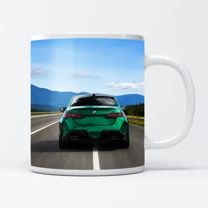 Green BMW M5 Sedan Speeding On Highway