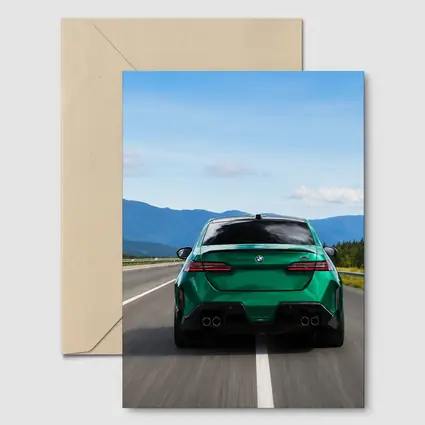 Green BMW M5 Sedan Speeding On Highway