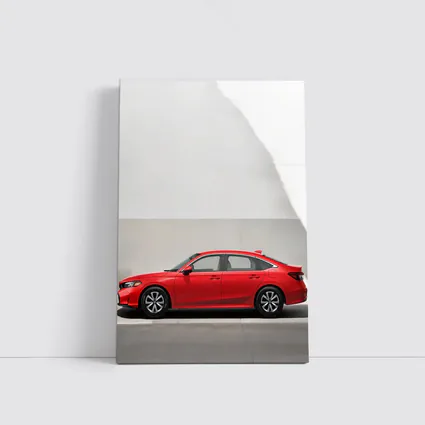 Red Honda Civic Parked Against Gray Wall