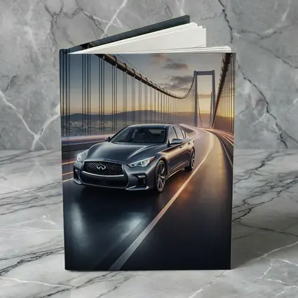 Infiniti Q50 Sedan Crossing Suspension Bridge Sunset