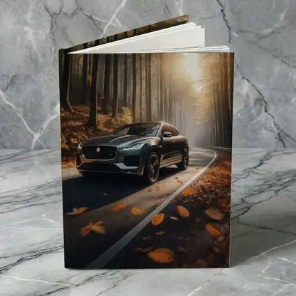Jaguar E Pace Driving Through Autumn Forest