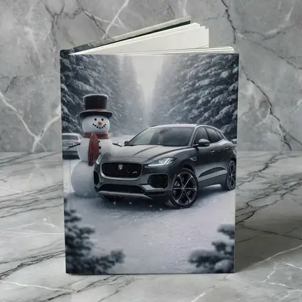 Jaguar E Pace Parked in Snowy Forest