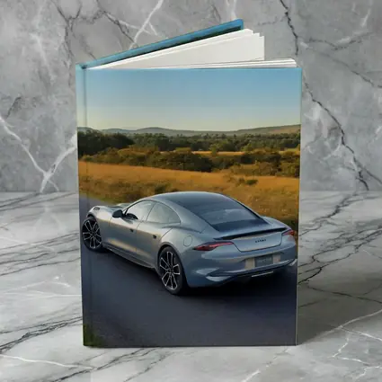 Karma Invictus Silver Car Country Road
