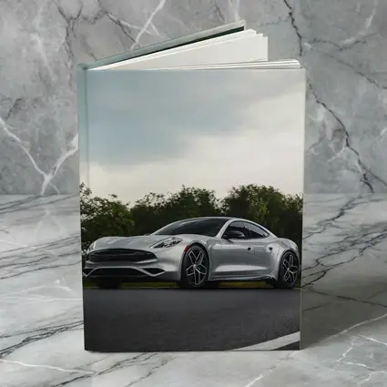 Karma Revero Silver Sports Car Road