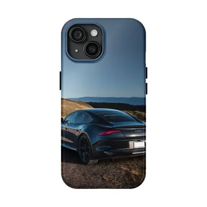 Karma Revero Dark Sedan Hillside Blue Sky