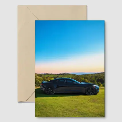 Karma Revero Black Car Sunset Landscape