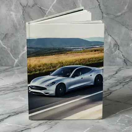 Karma Revero Silver Sedan Open Road Drive