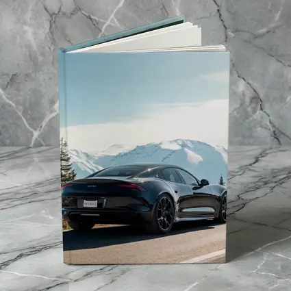 Karma Revero Black Car Snowy Mountain Road