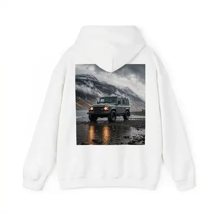 Land Rover Defender Parked On Rocky Shore