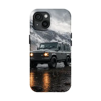 Land Rover Defender Parked On Rocky Shore