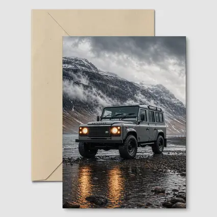 Land Rover Defender Parked On Rocky Shore