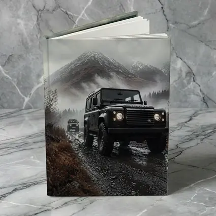 Land Rover Defender on Misty Mountain Trail