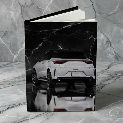 Lexus LBX White SUV Black Marble Background