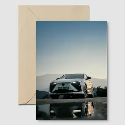 Lexus RZ White SUV Mountain Backdrop