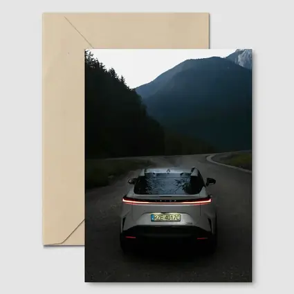 Lexus RZ On Mountain Road At Dusk