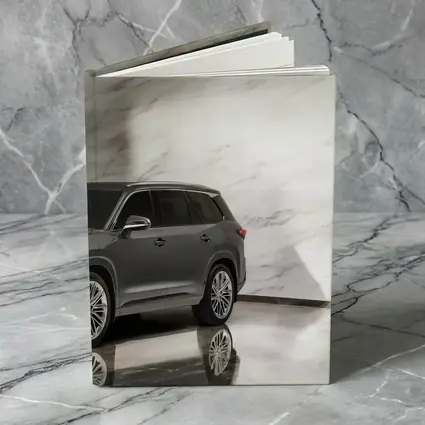 Lexus TX SUV Against White Marble Wall