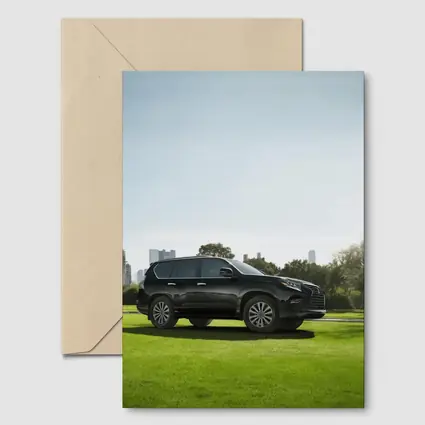 Black Lexus GX City Skyline Green Lawn