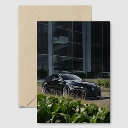 Black Lexus IS Parked Near Glass Building