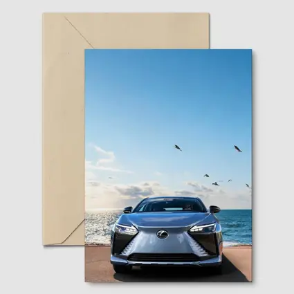 Lexus RZ Front View Ocean Background