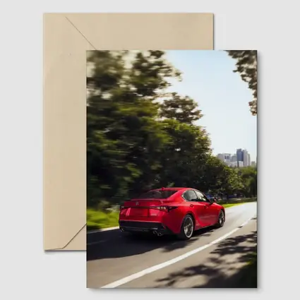 Lexus IS Red Sedan On City Road