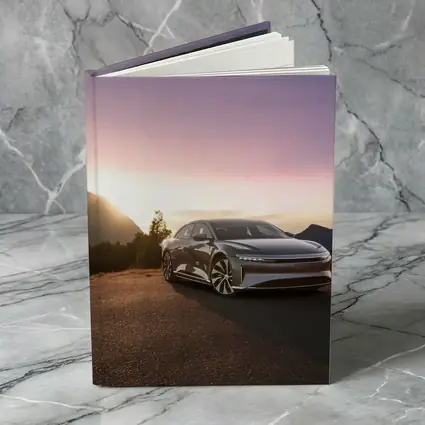 Lucid Air Parked Before Mountain Sunset