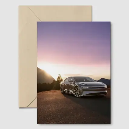 Lucid Air Parked Before Mountain Sunset