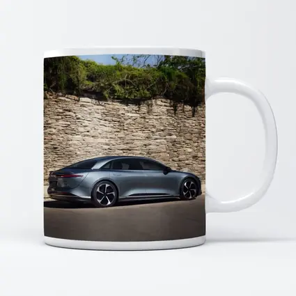 Lucid Air Sedan Parked By Stone Wall