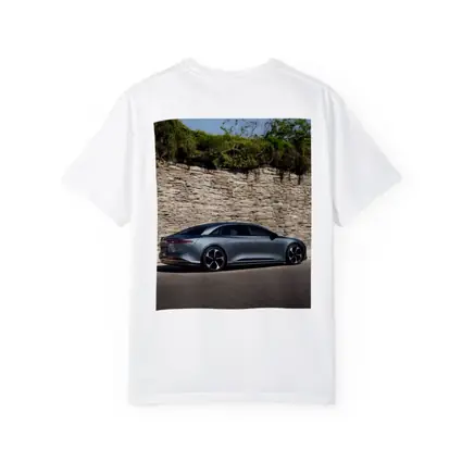 Lucid Air Sedan Parked By Stone Wall
