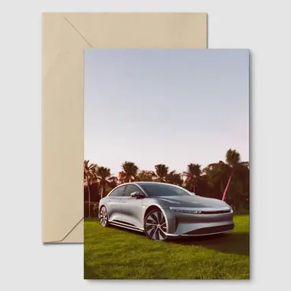 Lucid Air Silver Sedan Palm Trees Background