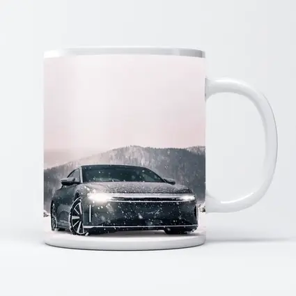 Lucid Air Electric Sedan In Snowy Landscape
