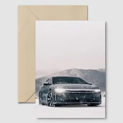 Lucid Air Electric Sedan In Snowy Landscape