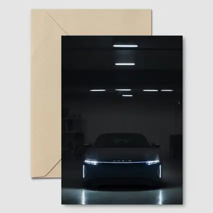 Lucid Air Glowing Headlights Dark Garage