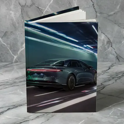 Lucid Air Speeding Through Neon Tunnel Night