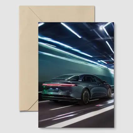 Lucid Air Speeding Through Neon Tunnel Night