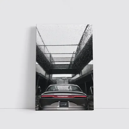 Lucid Air Sedan Rainy Urban Parking Structure