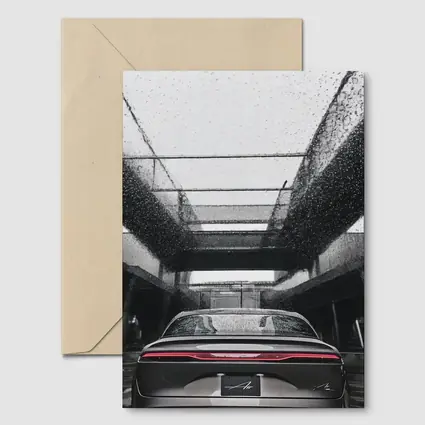 Lucid Air Sedan Rainy Urban Parking Structure