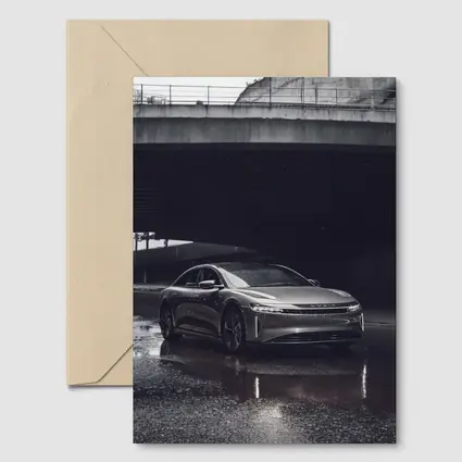 Lucid Air Sedan Wet Urban Street Night