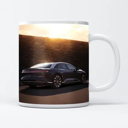 Lucid Air Sedan Parked Against Stone Wall
