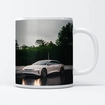 Lucid Air White Sedan Rainy City Street